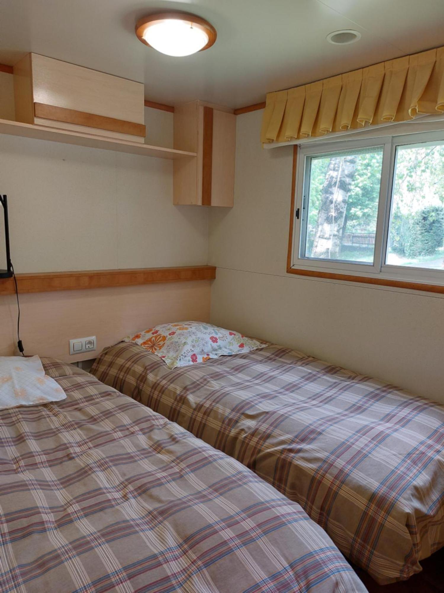 Camping L'Enclave Mobil-Home Estavar المظهر الخارجي الصورة